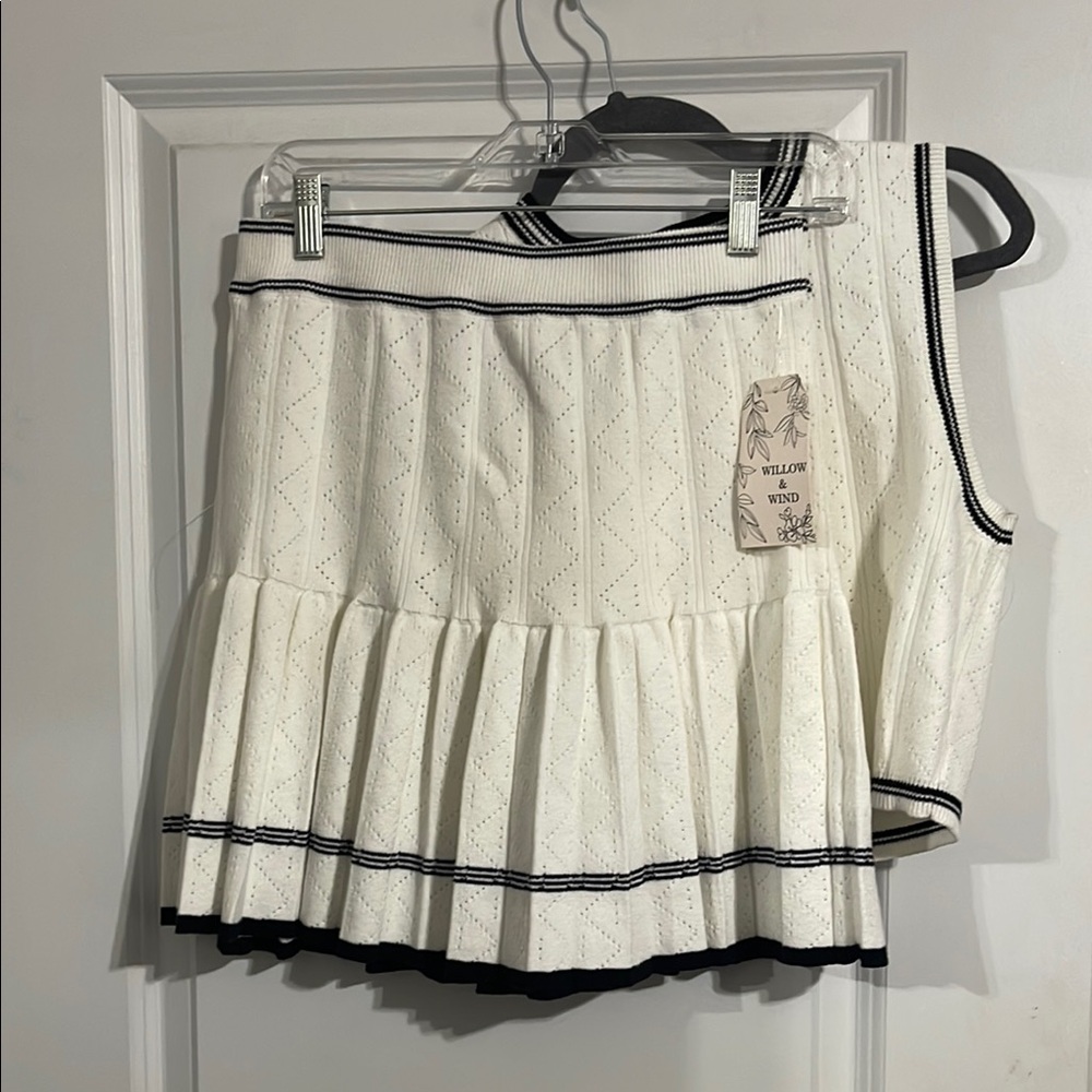 White Pleated Skirt Set with Cropped sleeveless top. Ivory